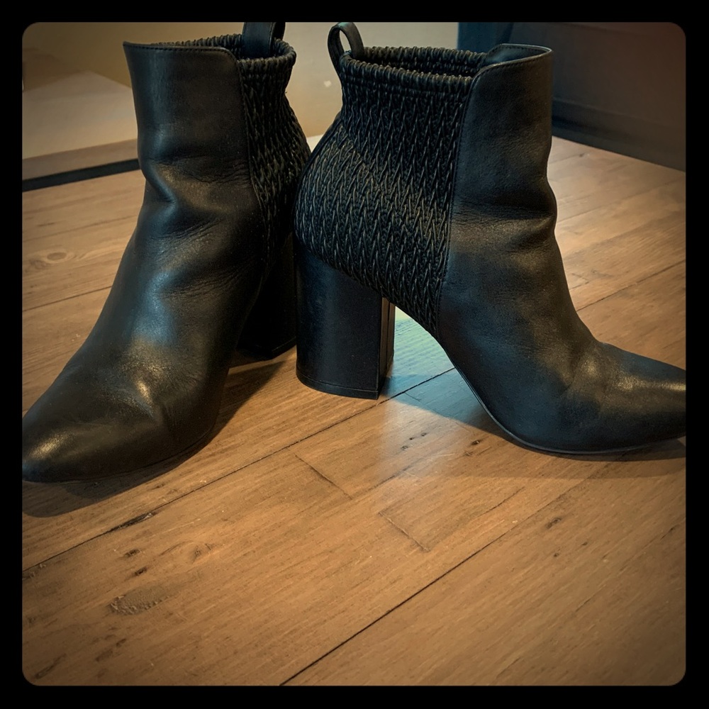 Black ankle boots by Cole Haan